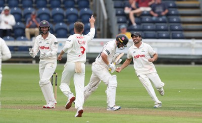 290625  Glamorgan v Gloucestershire, Rothesay County Championship Division 2 - Celebrations as Kiran Carlson of Glamorgan catches Miles Hammond of Gloucestershire off the bowling of Mason Crane of Glamorgan