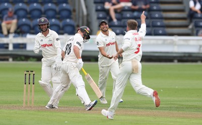290625  Glamorgan v Gloucestershire, Rothesay County Championship Division 2 - Celebrations as Kiran Carlson of Glamorgan catches Miles Hammond of Gloucestershire off the bowling of Mason Crane of Glamorgan