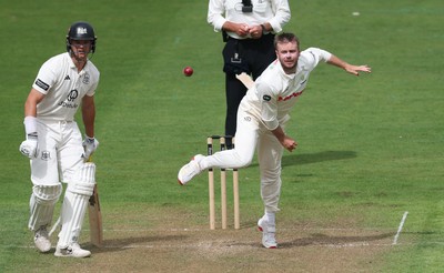 290625  Glamorgan v Gloucestershire, Rothesay County Championship Division 2 - Mason Crane of Glamorgan bowls