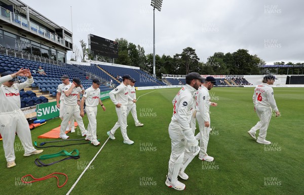 290625  Glamorgan v Gloucestershire, Rothesay County Championship Division 2 - Glamorgan head out for the start of the match