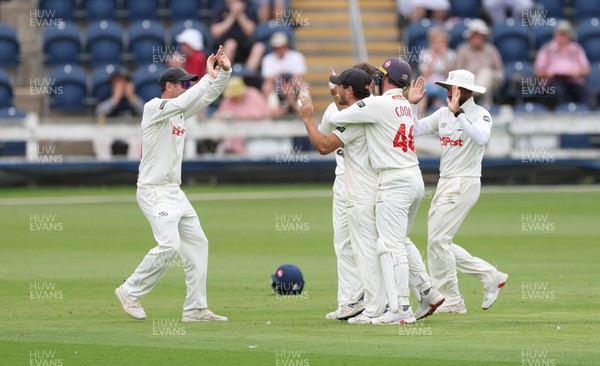 290625  Glamorgan v Gloucestershire, Rothesay County Championship Division 2 - Celebrations as Kiran Carlson of Glamorgan catches Miles Hammond of Gloucestershire off the bowling of Mason Crane of Glamorgan