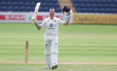 300625  Glamorgan v Gloucestershire, Rothesay County Championship Division 2 - James Bracey of Gloucestershire celebrates as he makes his 100