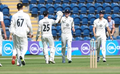 300625  Glamorgan v Gloucestershire, Rothesay County Championship Division 2 - Todd Murphy of Gloucestershire catches Kiran Carlson of Glamorgan