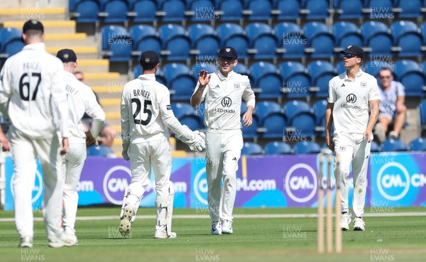300625  Glamorgan v Gloucestershire, Rothesay County Championship Division 2 - Todd Murphy of Gloucestershire catches Kiran Carlson of Glamorgan
