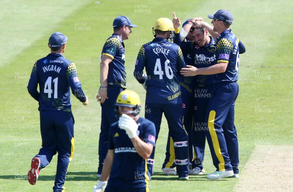 030618 - Glamorgan v Hampshire - Royal London One Day Cup - Andrew Salter of Glamorgan celebrates with team mates after successfully bowling James Vince for LBW