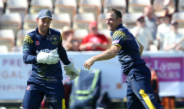 030618 - Glamorgan v Hampshire - Royal London One Day Cup - Graham Wagg celebrates with Chris Cooke of Glamorgan after Joe Weatherley is caught
