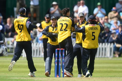 050825 - Glamorgan v Hampshire - Metro Bank One Day Cup - Asa Tribe of Glamorgan celebrates with team mates after he catches the ball to dismiss Tilak Varma of Hampshire