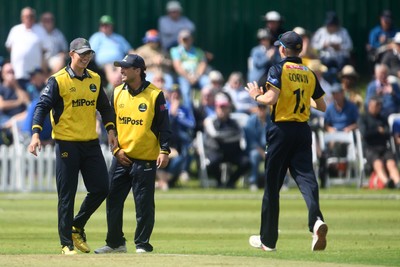 050825 - Glamorgan v Hampshire - Metro Bank One Day Cup - Asa Tribe of Glamorgan celebrates with team mates after he catches the ball to dismiss Tilak Varma of Hampshire