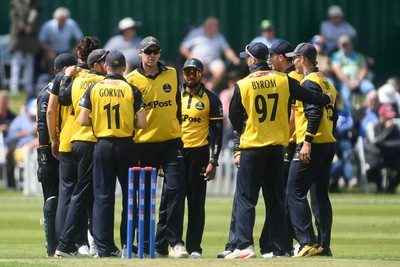 050825 - Glamorgan v Hampshire - Metro Bank One Day Cup - Asa Tribe of Glamorgan celebrates with team mates after he catches the ball to dismiss Tilak Varma of Hampshire