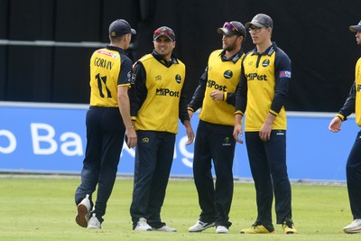 050825 - Glamorgan v Hampshire - Metro Bank One Day Cup - Kiran Carlson of Glamorgan catches the ball to dismiss Ben Mayes of Hampshire