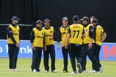 050825 - Glamorgan v Hampshire - Metro Bank One Day Cup - Kiran Carlson of Glamorgan catches the ball to dismiss Ben Mayes of Hampshire