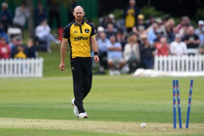 050825 - Glamorgan v Hampshire - Metro Bank One Day Cup - James Harris of Glamorgan bowls the ball to dismiss Andrew Neal of Hampshire