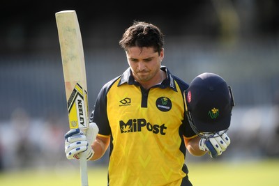050825 - Glamorgan v Hampshire - Metro Bank One Day Cup - Kiran Carlson of Glamorgan is caught out by Tom Prest of Hampshire but congratulated for hitting a career best of 135