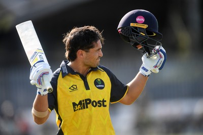 050825 - Glamorgan v Hampshire - Metro Bank One Day Cup - Kiran Carlson of Glamorgan is caught out by Tom Prest of Hampshire but congratulated for hitting a career best of 135