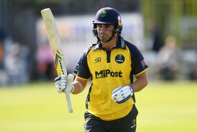 050825 - Glamorgan v Hampshire - Metro Bank One Day Cup - Kiran Carlson of Glamorgan is caught out by Tom Prest of Hampshire but congratulated for hitting a career best of 135