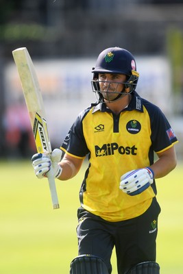 050825 - Glamorgan v Hampshire - Metro Bank One Day Cup - Kiran Carlson of Glamorgan is caught out by Tom Prest of Hampshire but congratulated for hitting a career best of 135