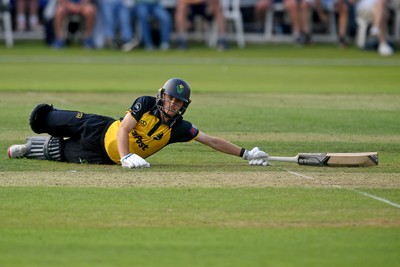 050825 - Glamorgan v Hampshire - Metro Bank One Day Cup - Andy Gorvin of Glamorgan dives to stay in
