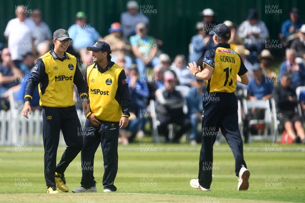 050825 - Glamorgan v Hampshire - Metro Bank One Day Cup - Asa Tribe of Glamorgan celebrates with team mates after he catches the ball to dismiss Tilak Varma of Hampshire