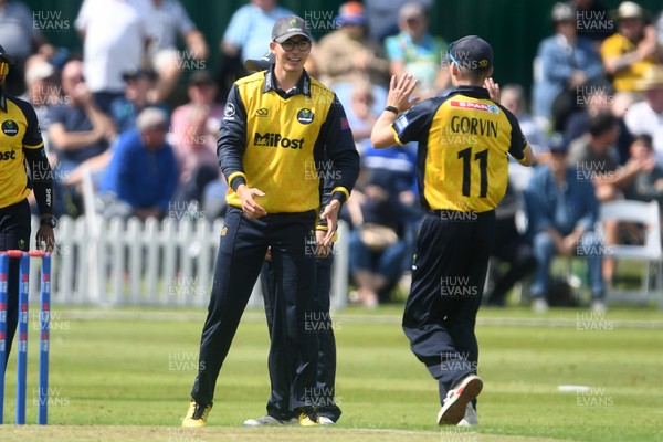 050825 - Glamorgan v Hampshire - Metro Bank One Day Cup - Asa Tribe of Glamorgan celebrates with team mates after he catches the ball to dismiss Tilak Varma of Hampshire