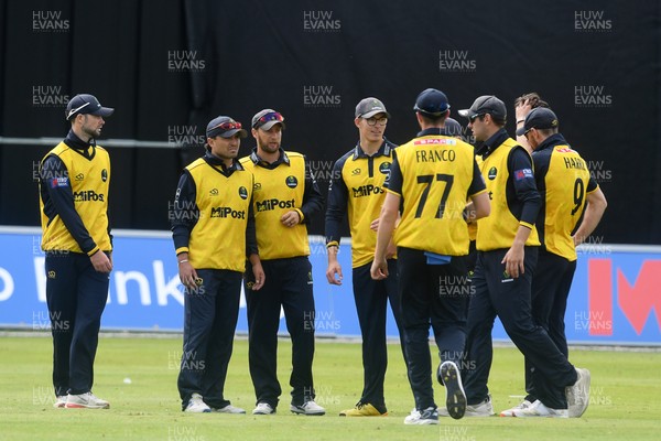 050825 - Glamorgan v Hampshire - Metro Bank One Day Cup - Kiran Carlson of Glamorgan catches the ball to dismiss Ben Mayes of Hampshire