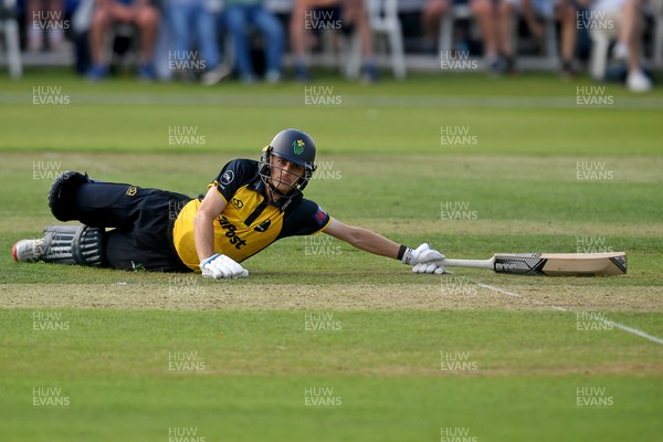 050825 - Glamorgan v Hampshire - Metro Bank One Day Cup - Andy Gorvin of Glamorgan dives to stay in