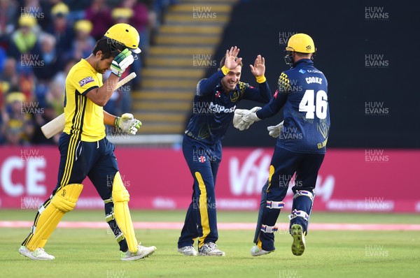 100818 - Glamorgan v Hampshire - Vitality Blast - Andrew Salter of Glamorgan celebrates the wicket of Rilee Rossouw of Hampshire with Chris Cooke