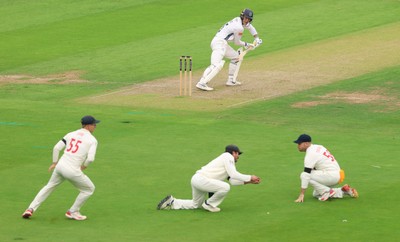 270826 - Glamorgan v Hampshire, Rothesay County Championship Division 1 - Kiran Carlson of Glamorgan fields the ball from Toby Albert of Hampshire