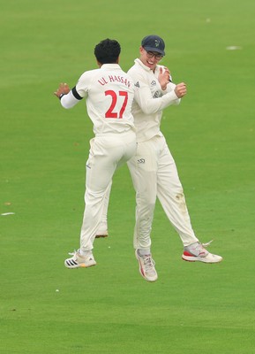 270826 - Glamorgan v Hampshire, Rothesay County Championship Division 1 - Zain ul Hassan of Glamorgan celebrates with Asa Tribe of Glamorgan after he bowls Toby Albert of Hampshire