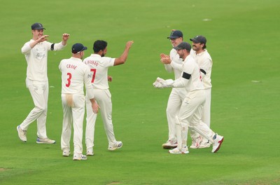 270826 - Glamorgan v Hampshire, Rothesay County Championship Division 1 - Zain ul Hassan of Glamorgan celebrates with Asa Tribe of Glamorgan after he bowls Toby Albert of Hampshire