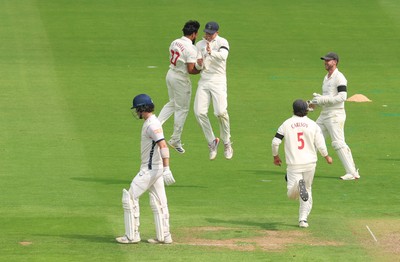 270826 - Glamorgan v Hampshire, Rothesay County Championship Division 1 - Zain ul Hassan of Glamorgan celebrates with Asa Tribe of Glamorgan after he takes the wicket of Ali Orr of Hampshire
