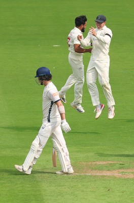 270826 - Glamorgan v Hampshire, Rothesay County Championship Division 1 - Zain ul Hassan of Glamorgan celebrates with Asa Tribe of Glamorgan after he takes the wicket of Ali Orr of Hampshire