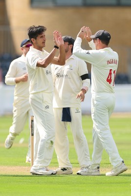 270826 - Glamorgan v Hampshire, Rothesay County Championship Division 1 - Mir Hamza of Glamorgan celebrates with Colin Ingram of Glamorgan after taking the wicket of Andrew Neal of Hampshire