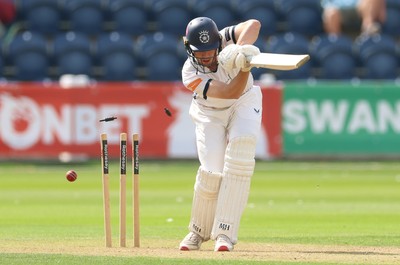 270826 - Glamorgan v Hampshire, Rothesay County Championship Division 1 - Scott Currie of Hampshire is bowled by Timm van der Gugten of Glamorgan