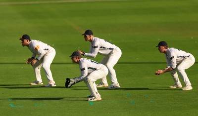 270826 - Glamorgan v Hampshire, Rothesay County Championship Division 1 - Hampshire fielders celebrate as Kyle Abbott of Hampshire dismisses Sean Dickson of Glamorgan