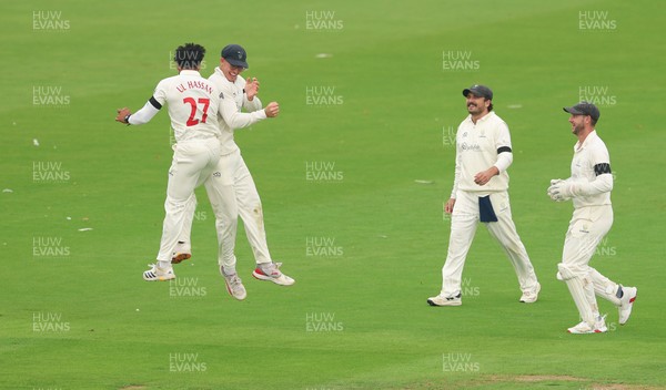 270826 - Glamorgan v Hampshire, Rothesay County Championship Division 1 - Zain ul Hassan of Glamorgan celebrates with Asa Tribe of Glamorgan after he bowls Toby Albert of Hampshire