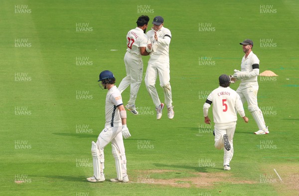 270826 - Glamorgan v Hampshire, Rothesay County Championship Division 1 - Zain ul Hassan of Glamorgan celebrates with Asa Tribe of Glamorgan after he takes the wicket of Ali Orr of Hampshire