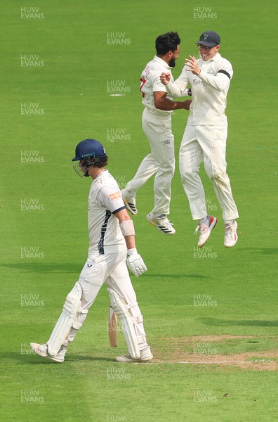 270826 - Glamorgan v Hampshire, Rothesay County Championship Division 1 - Zain ul Hassan of Glamorgan celebrates with Asa Tribe of Glamorgan after he takes the wicket of Ali Orr of Hampshire