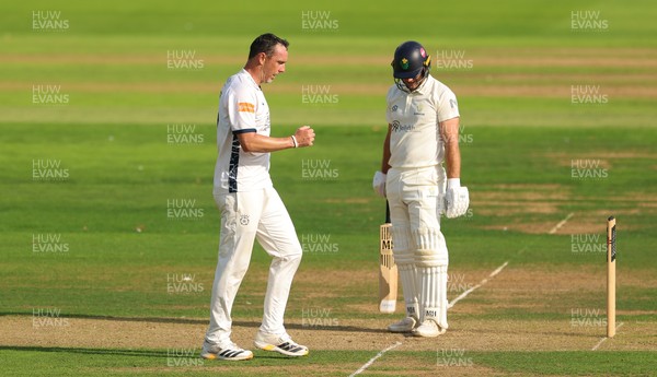 270826 - Glamorgan v Hampshire, Rothesay County Championship Division 1 - Kyle Abbott of Hampshire celebrates as he dismisses Colin Ingram of Glamorgan