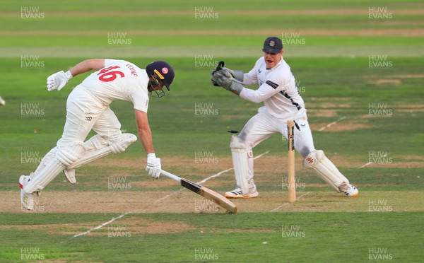 270826 - Glamorgan v Hampshire, Rothesay County Championship Division 1 - Chris Cooke of Glamorgan survives a runout attempt and appeal