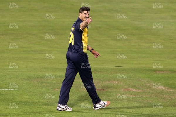 300819 - Glamorgan v Hampshire - Vitality T20 Blast - Marchant De Lange of Glamorgan celebrates the wicket of James Vince of Hampshire who is caught by David Lloyd