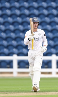 300826 Glamorgan v Hampshire, Rothesay County Championship Division 1 - Toby Albert of Hampshire celebrates as he makes his 50