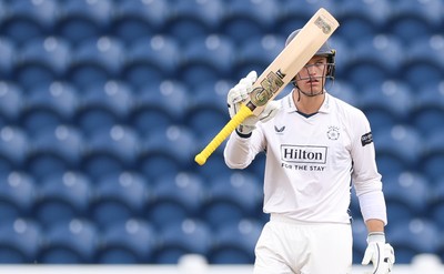 300826 Glamorgan v Hampshire, Rothesay County Championship Division 1 - Toby Albert of Hampshire celebrates as he makes his 50