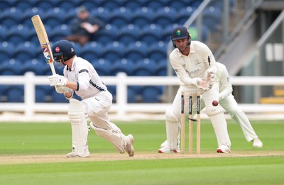 300826 Glamorgan v Hampshire, Rothesay County Championship Division 1 - Tom Prest of Hampshire is bowled out by Ben Kellaway of Glamorgan