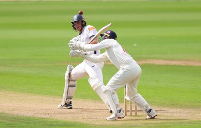 300826 Glamorgan v Hampshire, Rothesay County Championship Division 1 - Eddie Jack of Hampshire hits a four over the head of Chris Cooke of Glamorgan