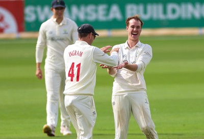 300826 Glamorgan v Hampshire, Rothesay County Championship Division 1 - Ben Kellaway of Glamorgan  celebrates with Colin Ingram of Glamorgan after taking the wicket of James Fuller of Hampshire