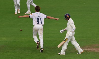 300826 Glamorgan v Hampshire, Rothesay County Championship Division 1 - Eddie Jack of Hampshire celebrates as he dismisses Mason Crane of Glamorgan