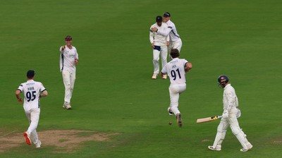 300826 Glamorgan v Hampshire, Rothesay County Championship Division 1 - Eddie Jack of Hampshire celebrates as he dismisses Mason Crane of Glamorgan