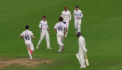 300826 Glamorgan v Hampshire, Rothesay County Championship Division 1 - Eddie Jack of Hampshire celebrates as he dismisses Mason Crane of Glamorgan