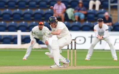 300826 Glamorgan v Hampshire, Rothesay County Championship Division 1 - Colin Ingram of Glamorgan takes action to avoid the ball