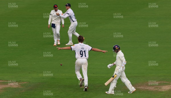 300826 Glamorgan v Hampshire, Rothesay County Championship Division 1 - Eddie Jack of Hampshire celebrates as he dismisses Mason Crane of Glamorgan